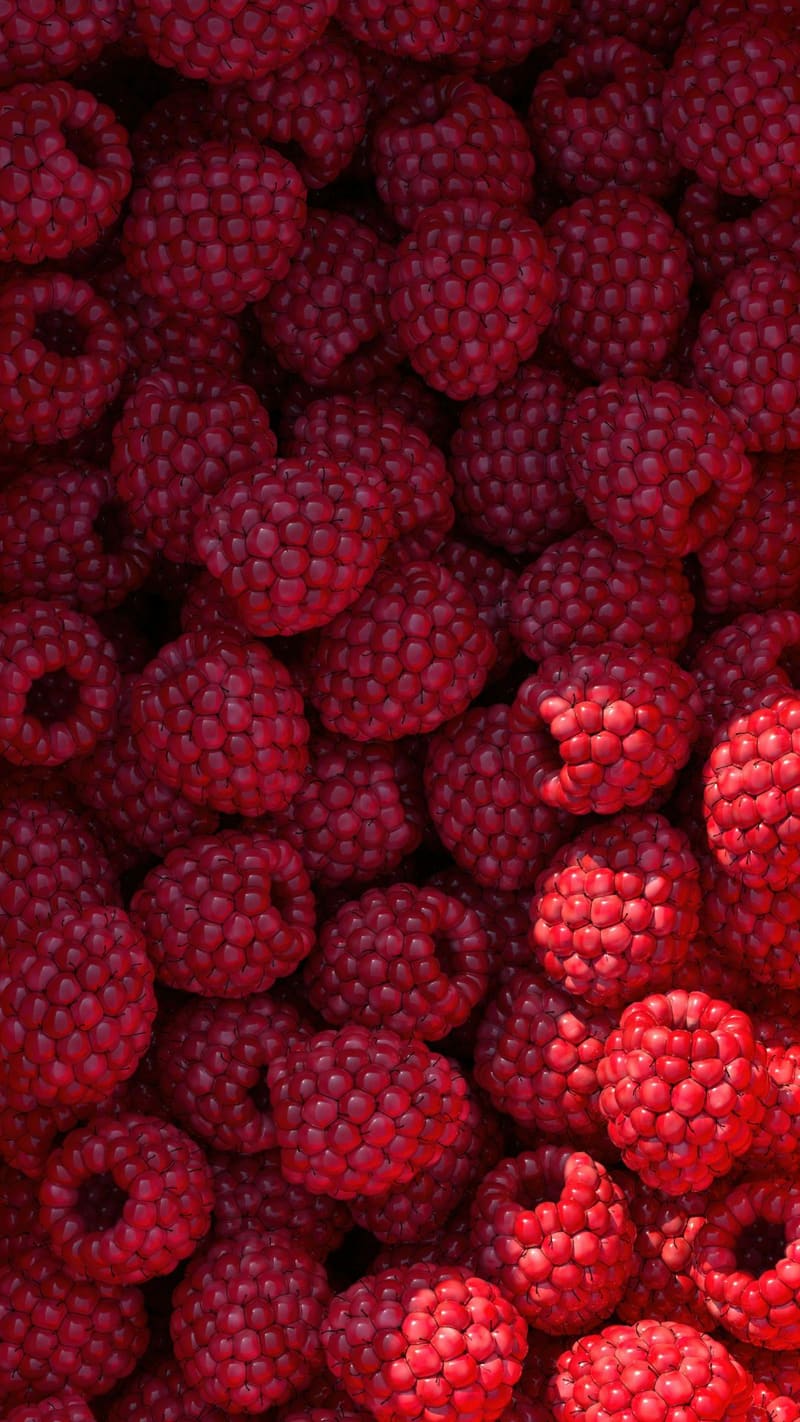 a pile of raspberries