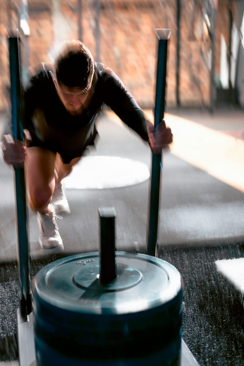 pushing a weighted sled