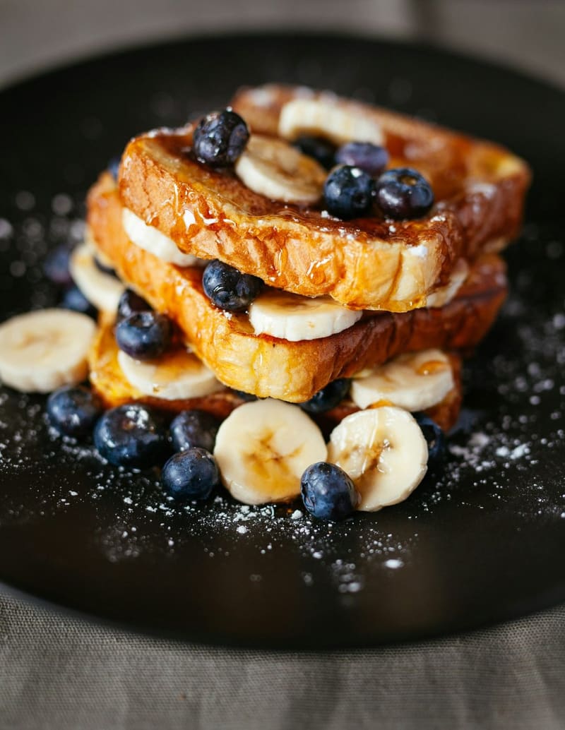french toast with banana and blueberries