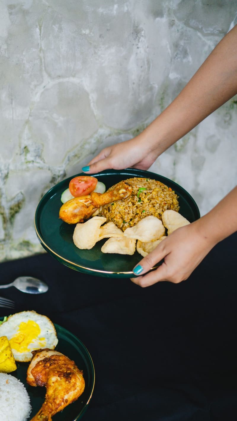 serving a plate of fried rice