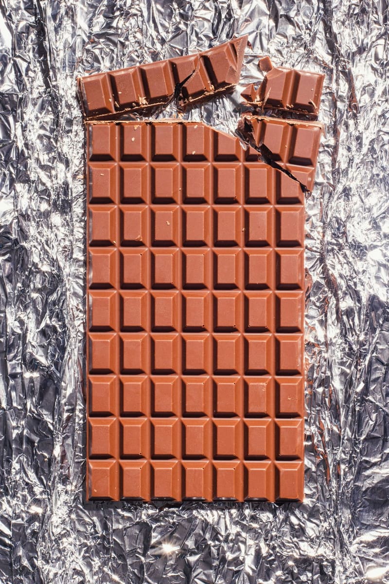 a bar of milk chocolate in foil