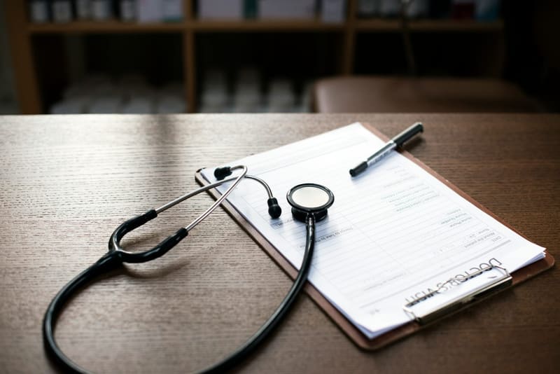 a stethoscope on a clipboard