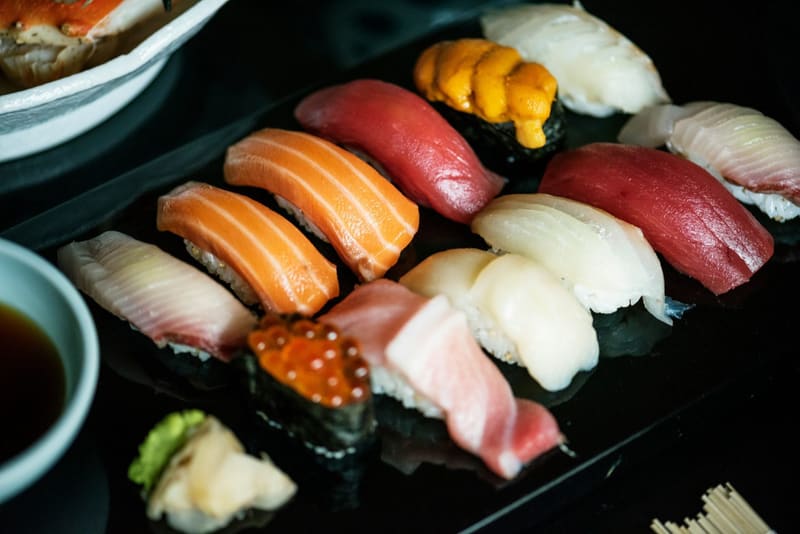 a tray of nigiri sushi