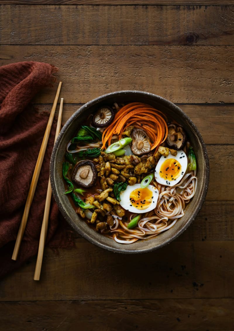 a bowl of ramen with eggs