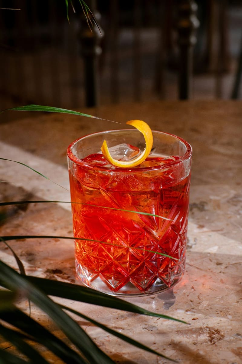 a negroni in a cut glass