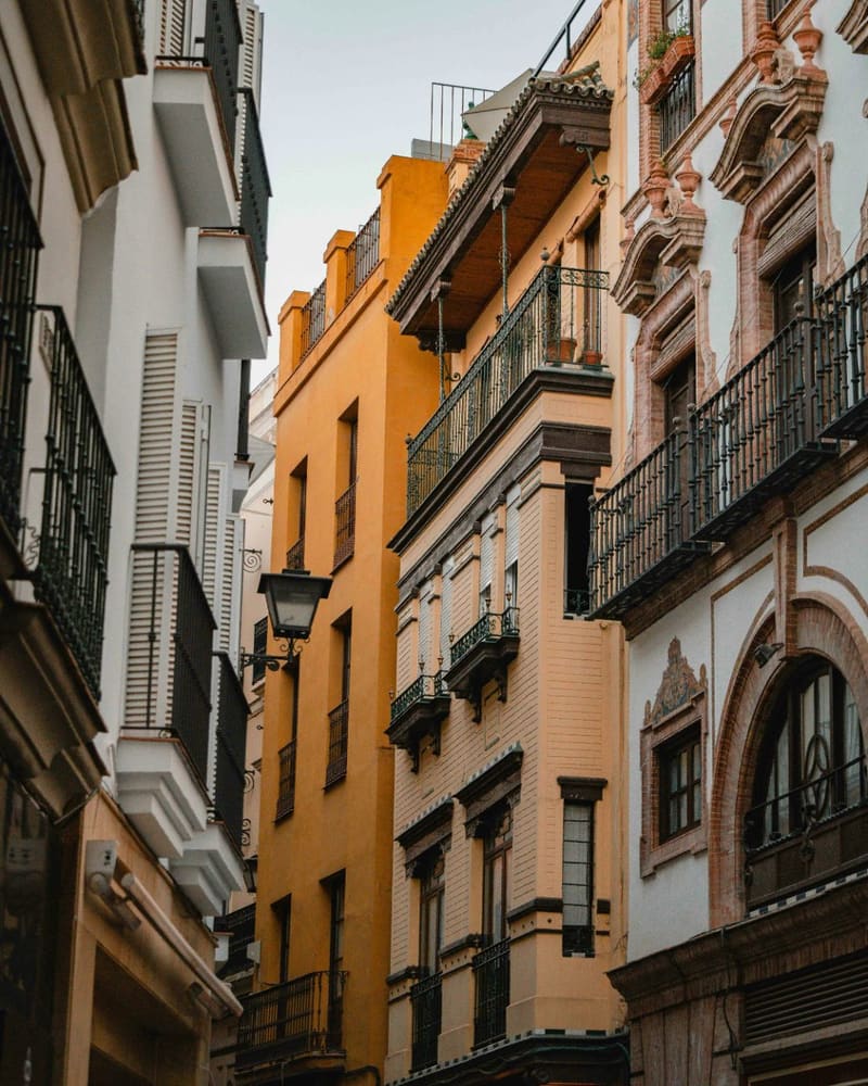 an old town street with balconies