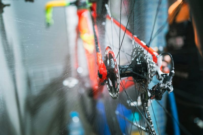 a red road bike drivetrain