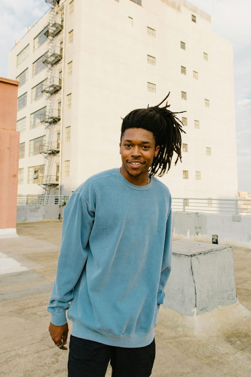 a young man on a rooftop