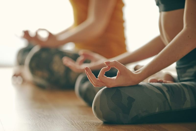 hands in a mudra during yoga