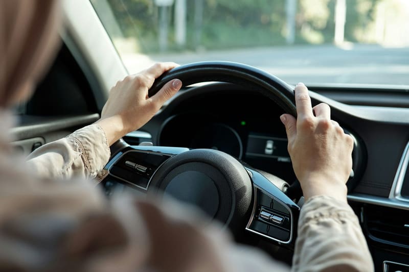 a learner and instructor at the wheel