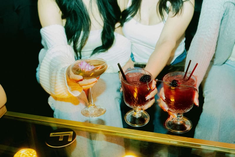 cocktails on a brass bar top