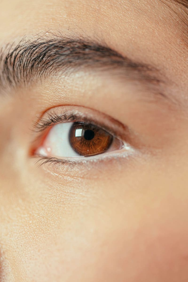 a close up of a brown eye