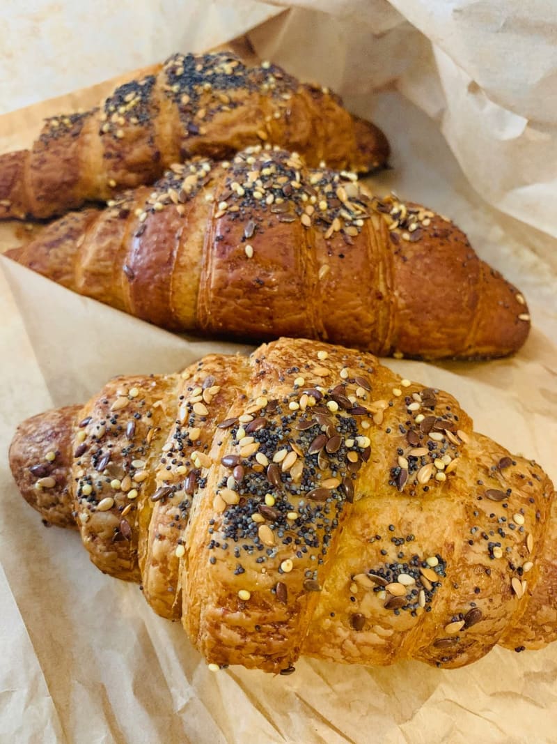 seeded croissants on paper