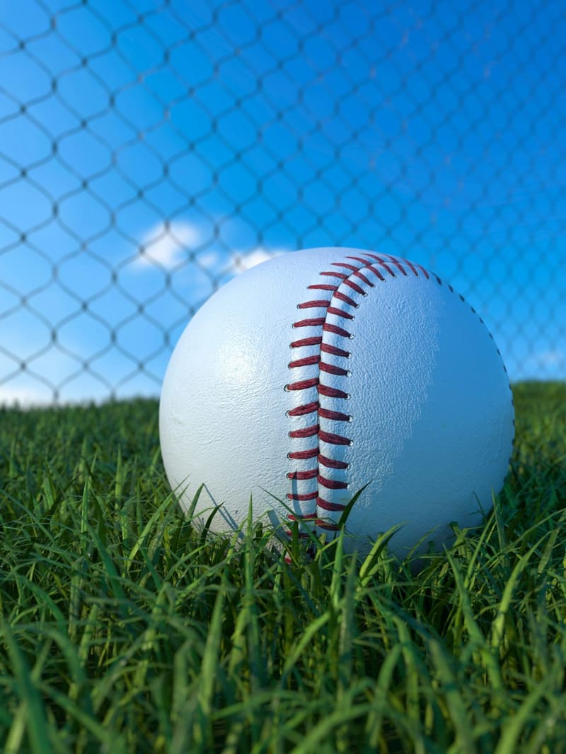 a baseball on grass