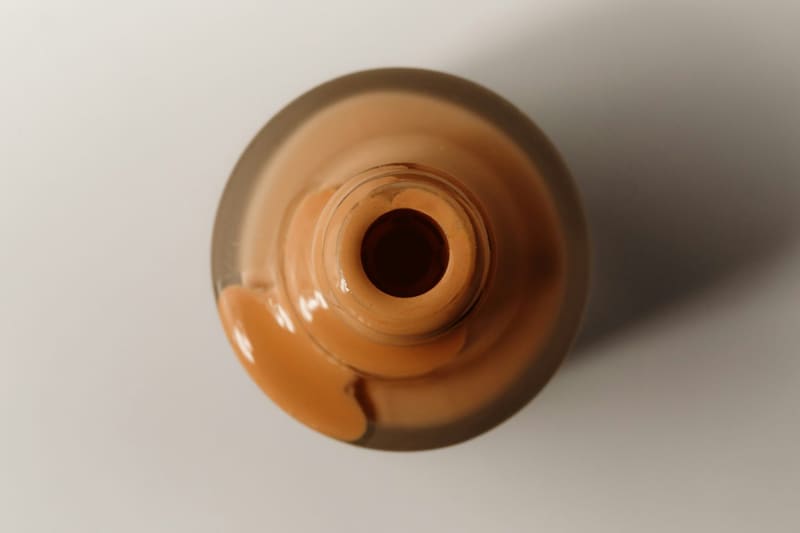 a bottle of spilled foundation