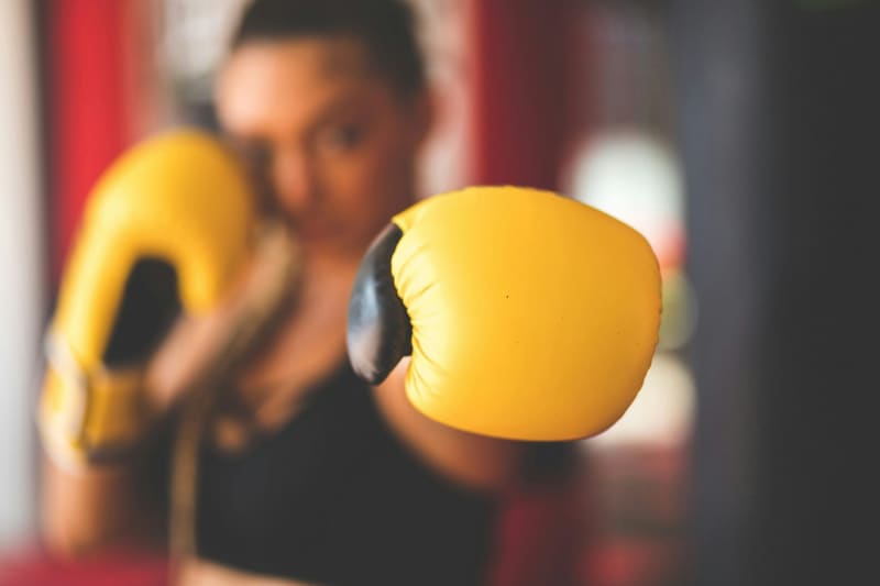 a yellow boxing glove close up