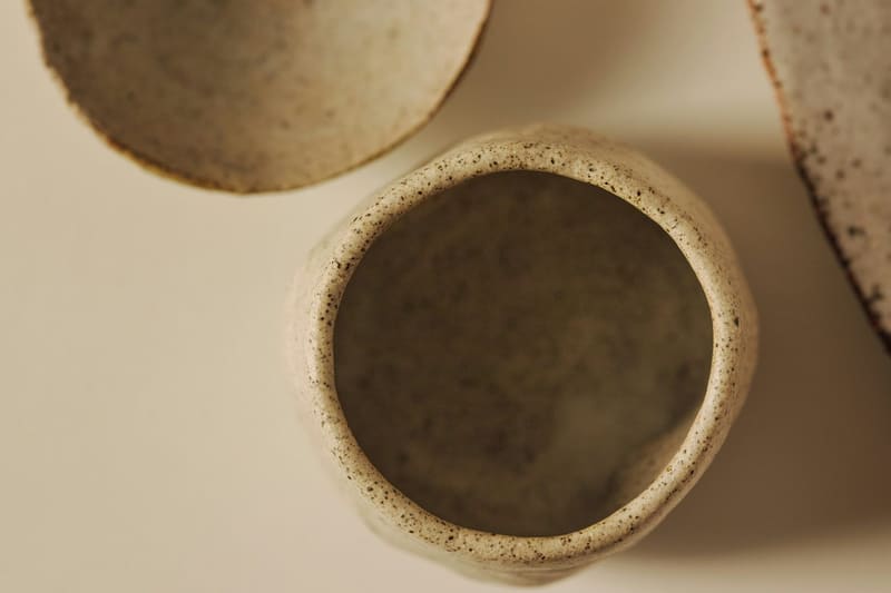 a speckled ceramic cup from above