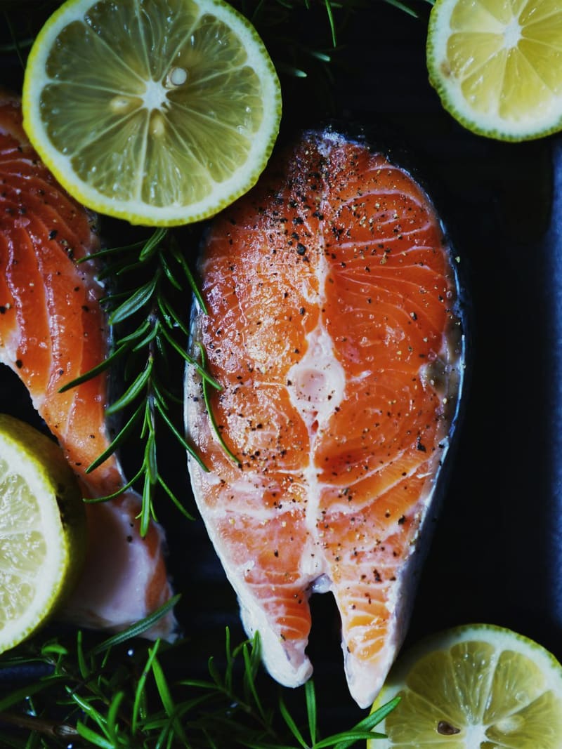 raw salmon steaks with lemon