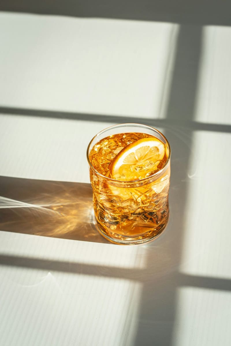 an iced tea in window light