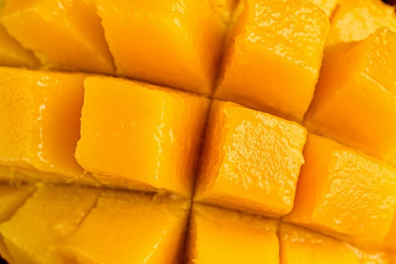 a scored mango half