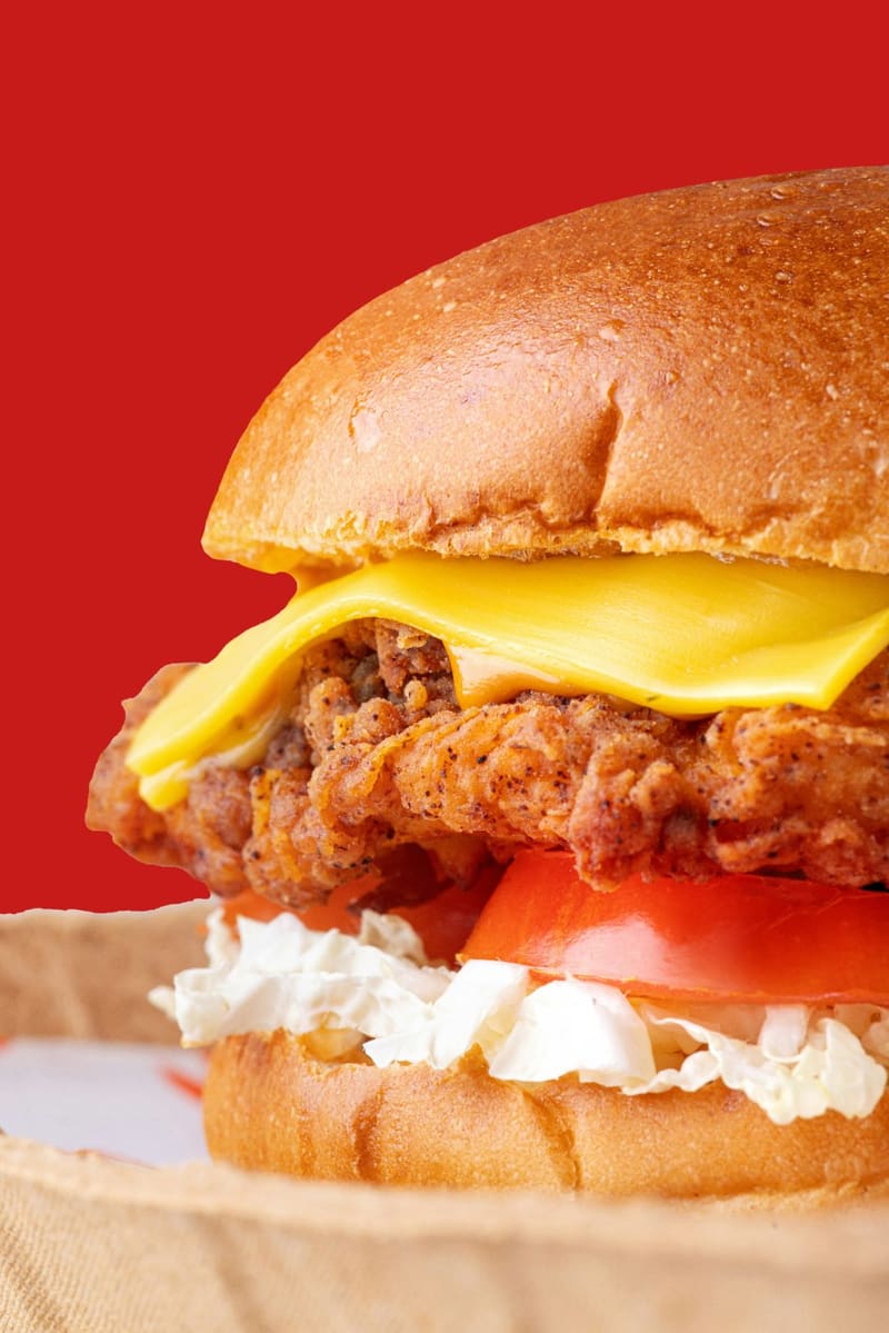 a fried chicken burger with cheese