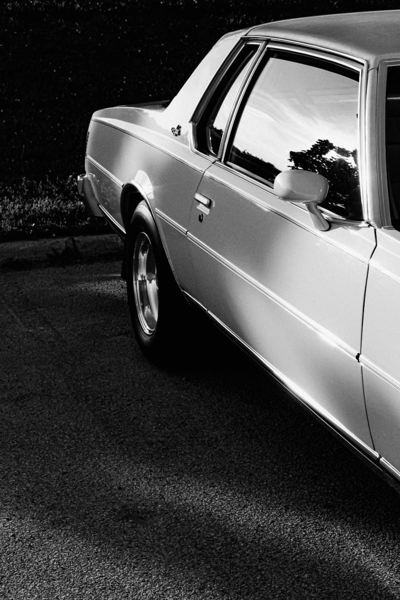 a classic saloon car in black and white