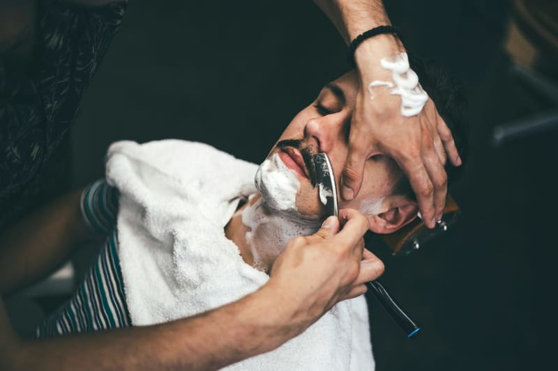 a hot towel shave in progress