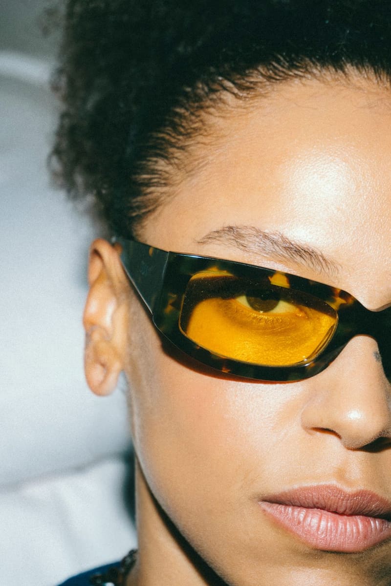 yellow-lensed sunglasses on a face