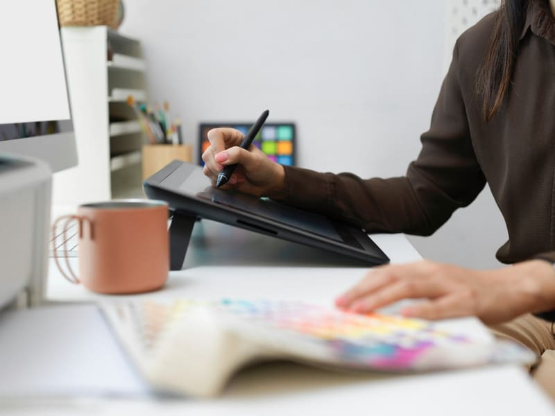 a designer at a graphics tablet