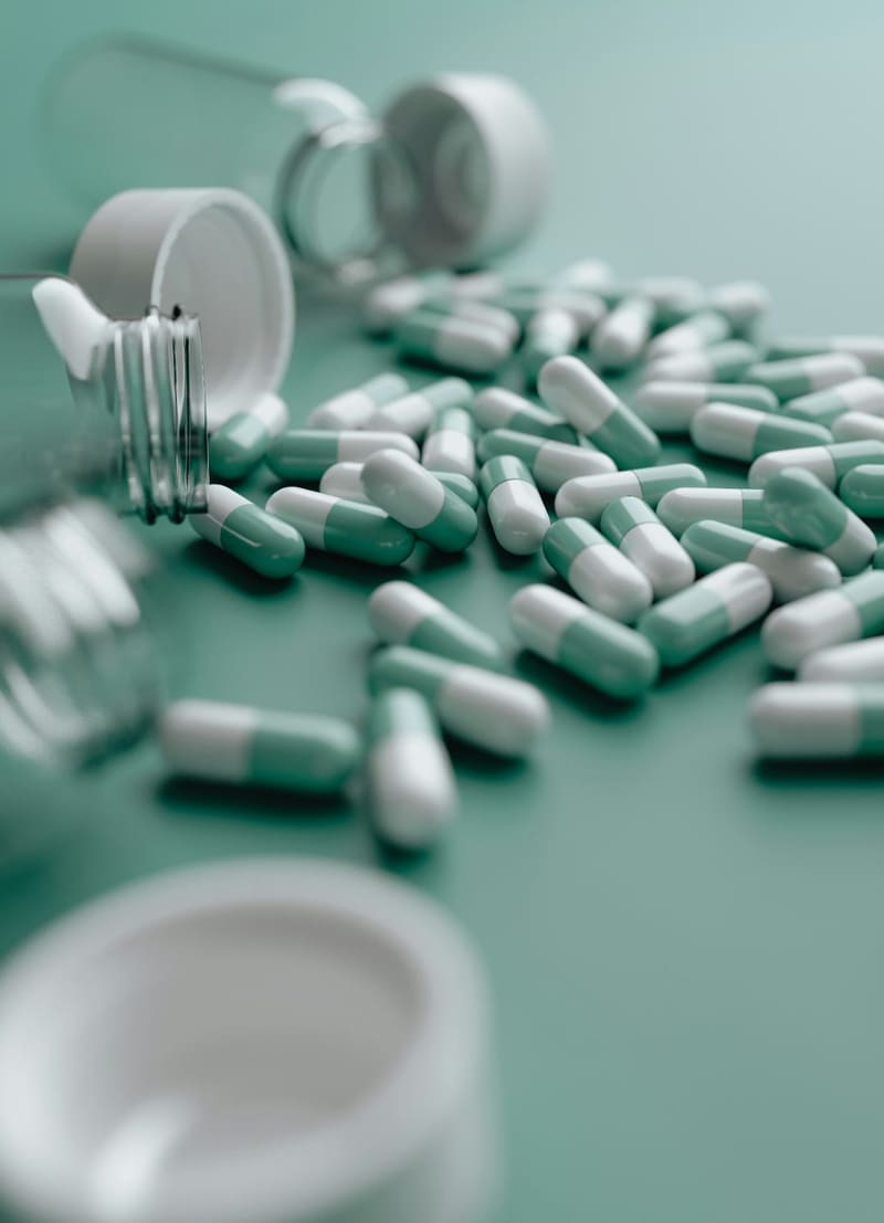 capsules spilling from a jar