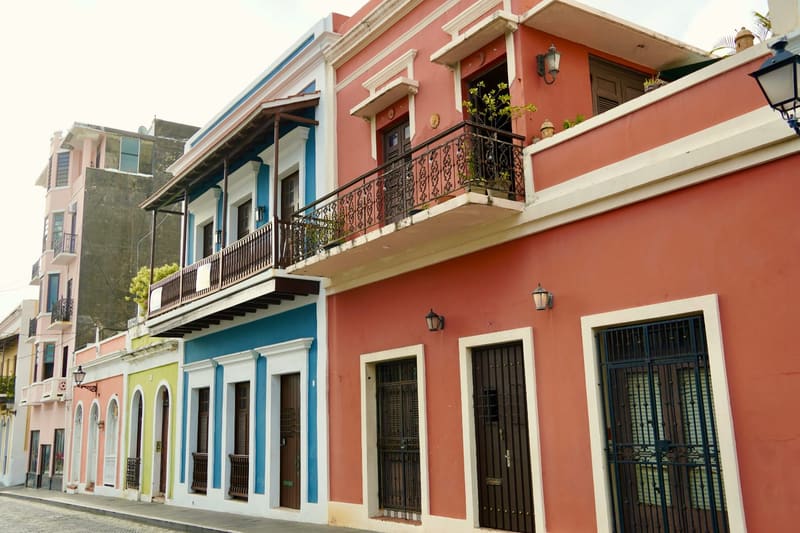 pink and blue colonial facades