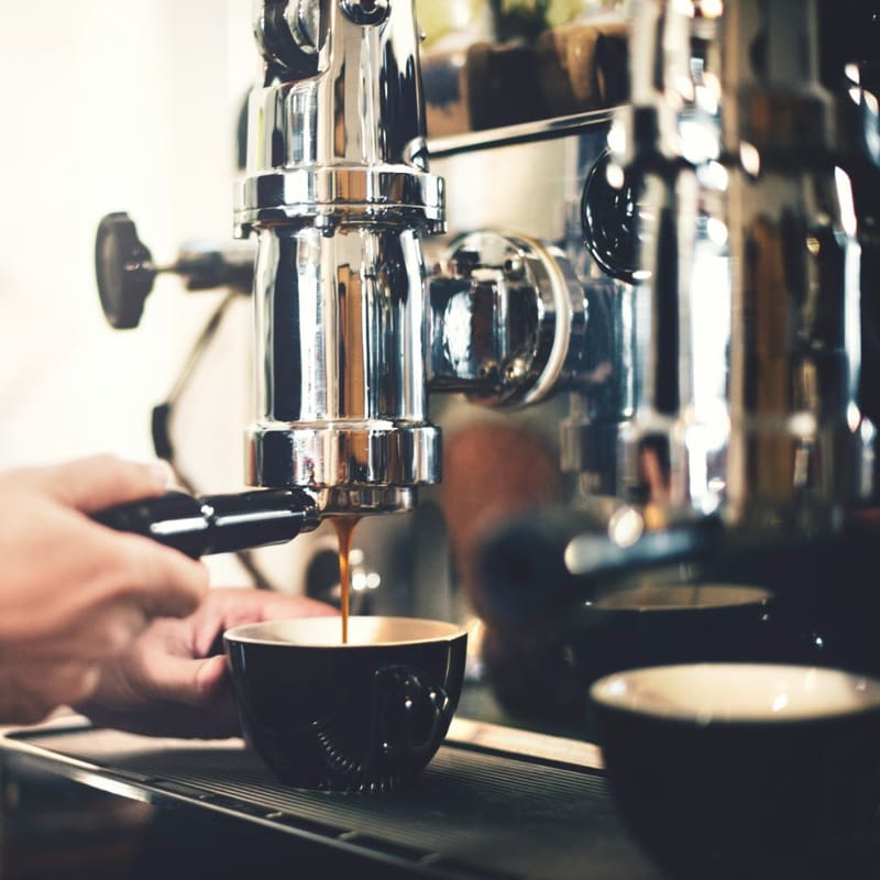 espresso pouring from a machine