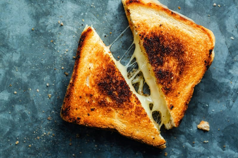 a toasted cheese sandwich pulled apart