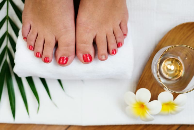 painted toenails on a towel