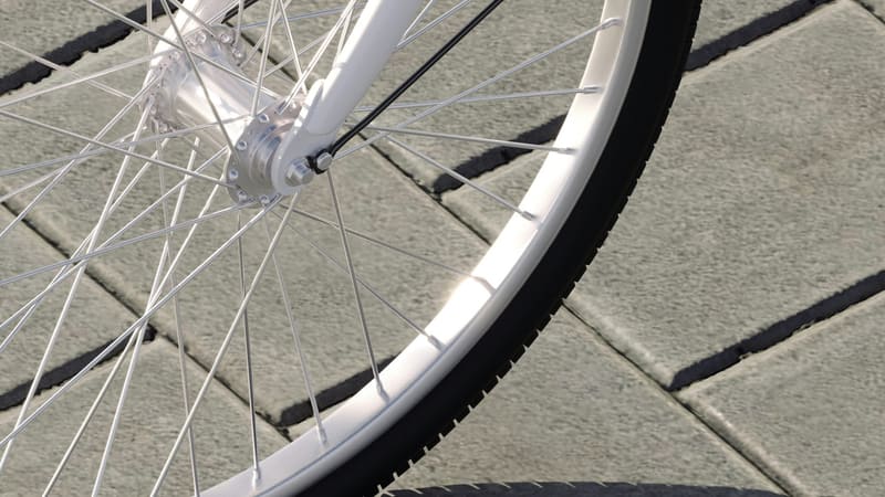 a white bicycle front wheel
