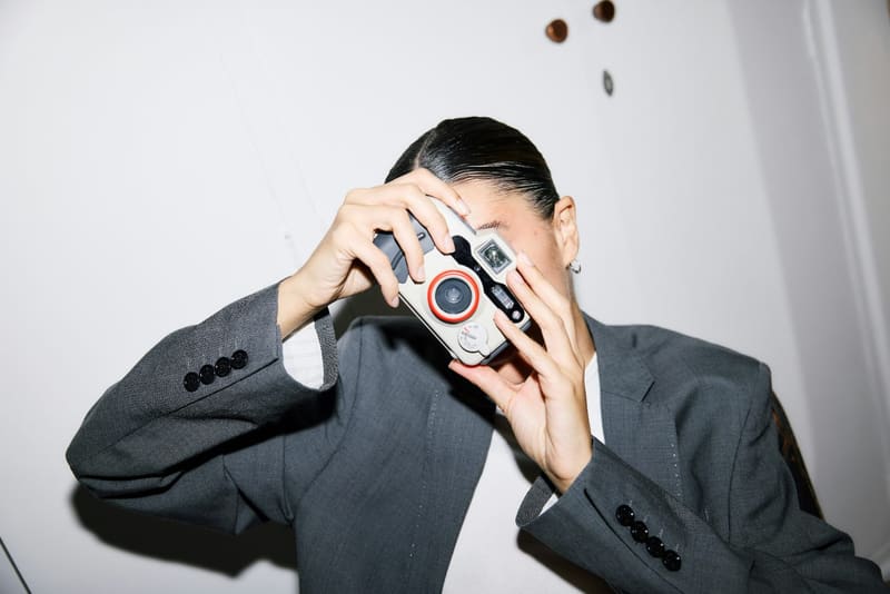 a person taking a photo with a camera